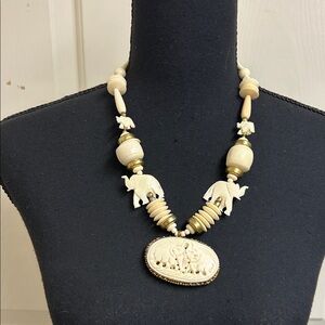 Ivory-Tone Carved Elephant Pendant Necklace - Women
